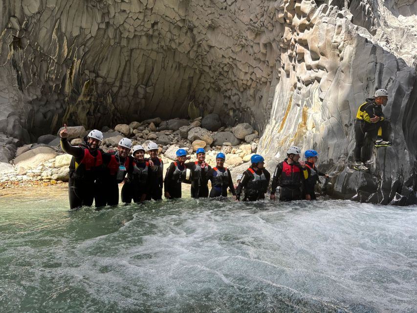 Alcantara River and Gorges: Bodyrafting Experience - Walking upstream through volcanic rock