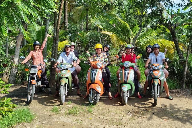 Ben Tre: Scooter, Culture, Sailboat and Mekong Food (Half Day) - Ben Tre market, fruit, and backstreets