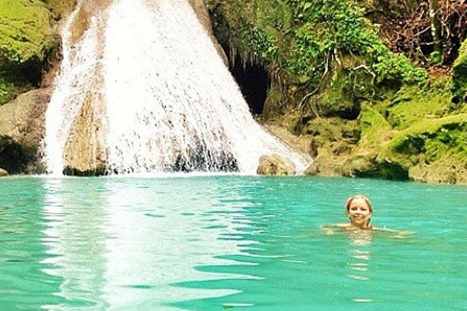 Blue Hole and River Tubing Combo from Ocho Rios - Blue Hole first: waterfall jumps with a rough edge