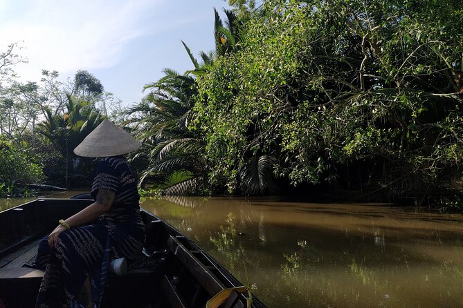 Boat tour on Mekong river see the sunset, small canal, Vegan dinner, street food - Chua Ong, also called Ong Temple