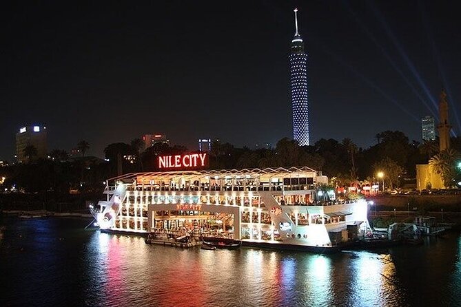 Cairo: Dinner Cruise on the Nile River with Entertainment - Cairo after sunset from the Nile