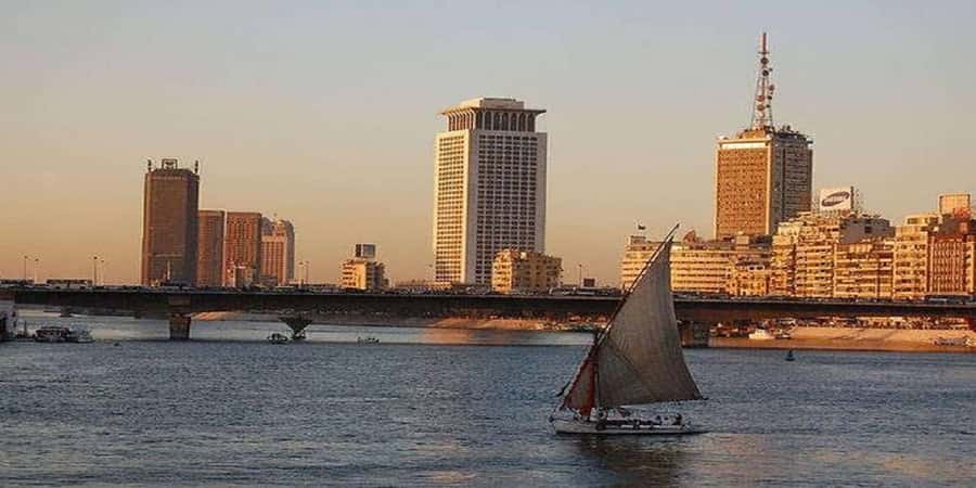 Cairo: Felucca ride on The Nile River with Meals - Stepping onto a traditional felucca