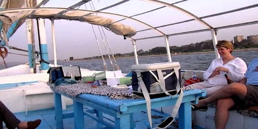 Cairo: Felucca ride on The Nile River with Meals - Eating an Egyptian meal on the water