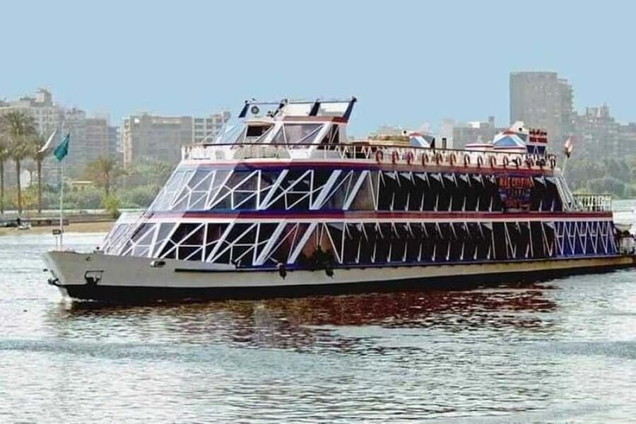 Cairo: Nile Dinner Cruise with Belly Dancer Show and Music - The upper deck and Cairo by night