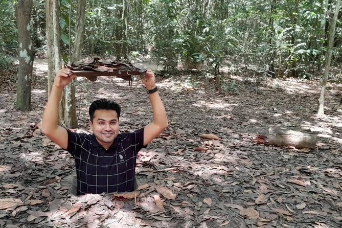 Crawl and Paddle Full day Cu Chi Tunnels and MeKong Delta - Honey tea, music, and village life
