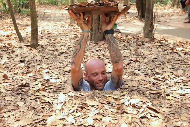 Cu Chi Tunnels and Mekong Delta 1 Day From Ho Chi Minh City - Village roads, fruit, and coconut candy