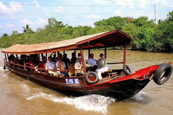 Cu Chi Tunnels and Mekong Delta - Small Group Tour - Honey tea, fruit, coconut candy, and local work