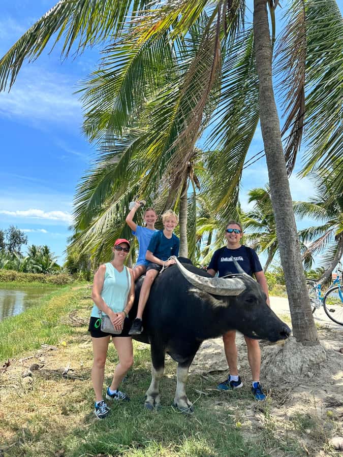 Da Nang or Hoi An: Countryside Bike & Basket Boat Tour - Cycling through working village country