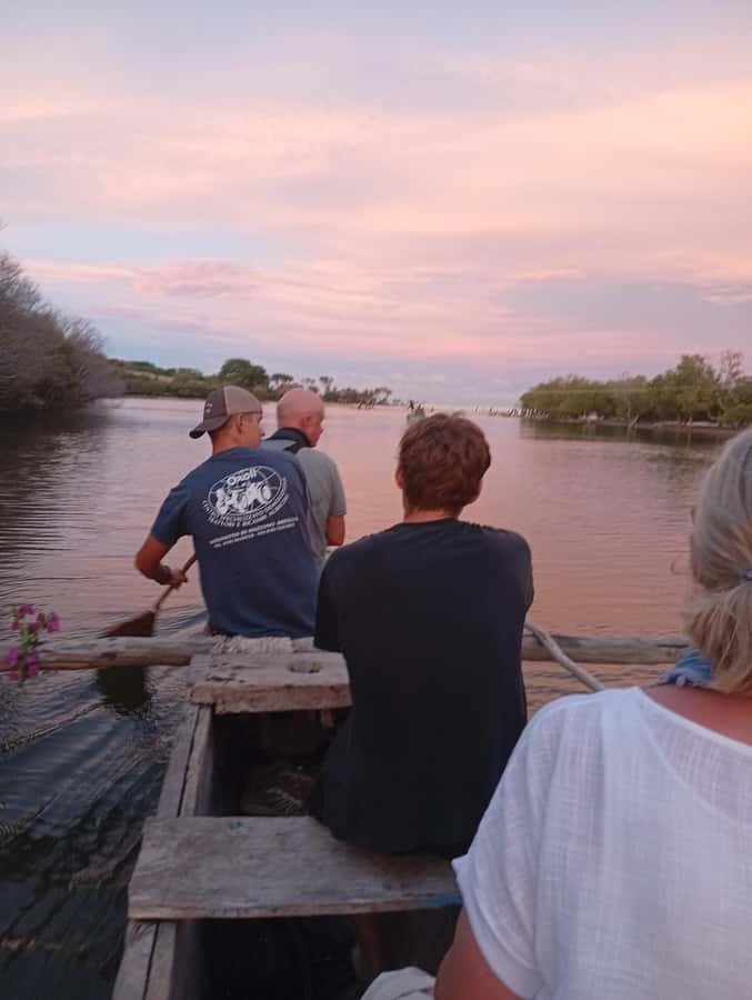 Diani Beach: Kongo River Sunset Experience in a canoe - Boarding a traditional canoe at Kongo River