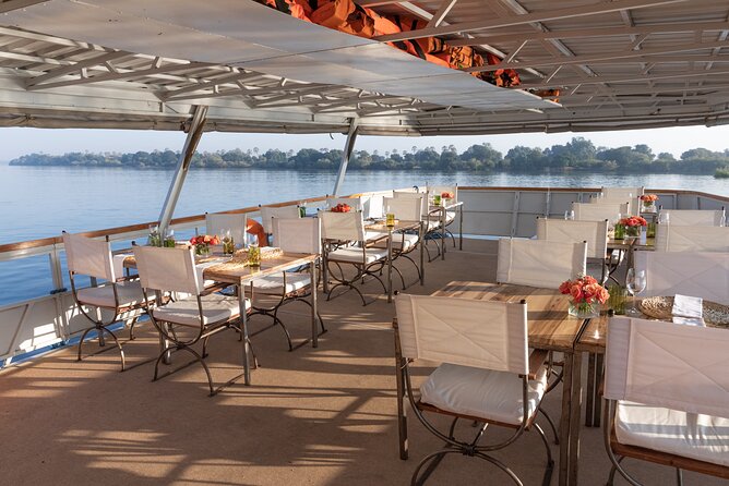 Dinner Cruise on the Zambezi River - The upper Zambezi, mist, and a very big river