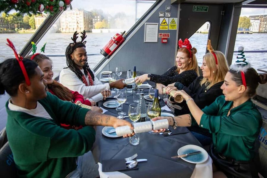 Festive London Christmas Day River Thames Lunch Cruise - A welcome drink sets the Christmas mood