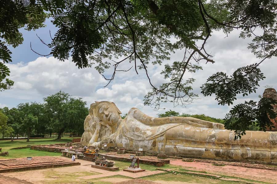 From Bangkok: Ayutthaya Day Tour by Bus with River Cruise - Wat Mahathat and the Buddha head in the roots