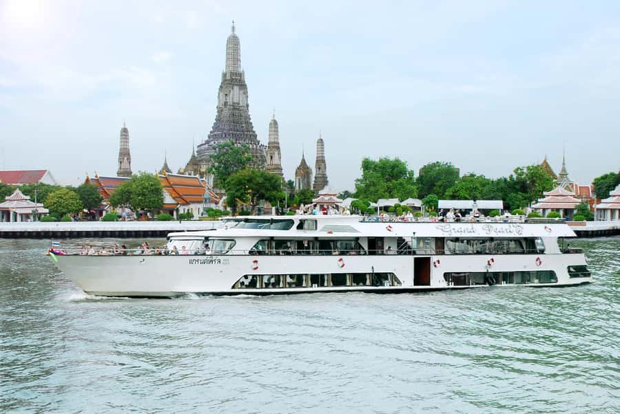 From Bangkok: Ayutthaya Day Tour by Bus with River Cruise - Meeting in Bangkok and riding north