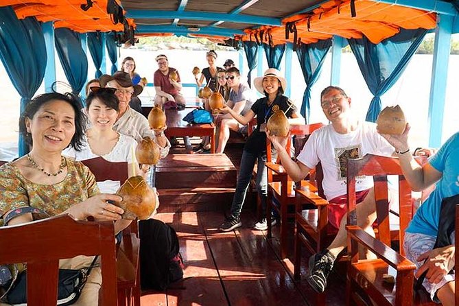 From HCM City: Mekong Delta Tour with Sampan Journey - The sampan through coconut-lined canals