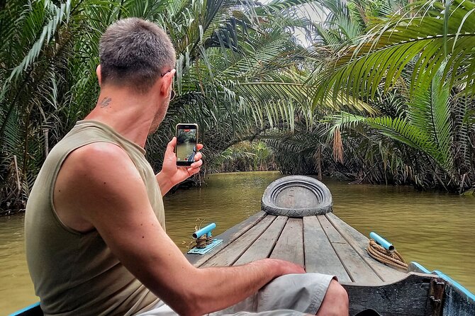 From Ho Chi Minh City: Discover Mekong Delta & Coconut Village - Cruising the Tien River near My Tho