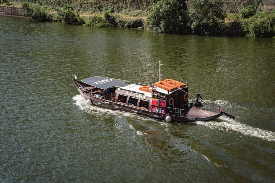 From Pinhão: Douro Valley Rabelo Boat Tour with Audio Guide - Under the Eiffel Bridge and toward Romaneira