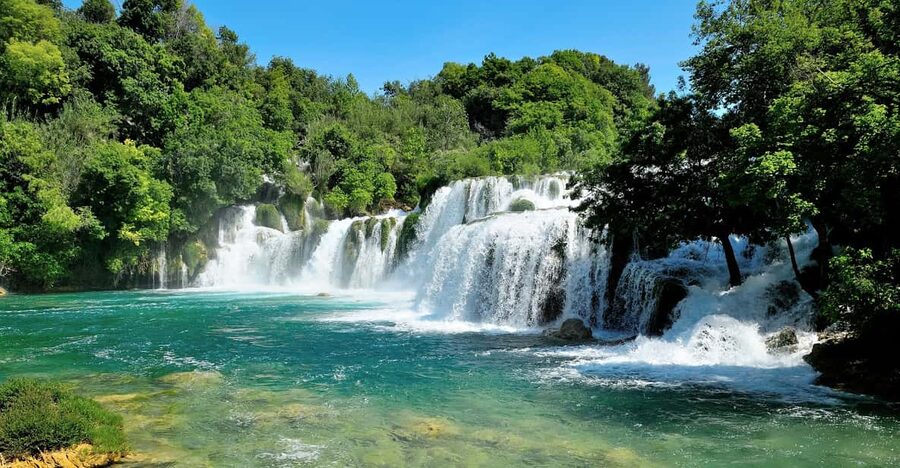 From Split: Krka Waterfalls with Riverboat Ride & swimm stop - Skradin adds the swimming break