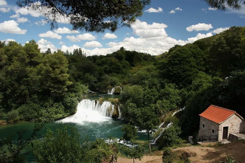 From Split: Krka Waterfalls with Riverboat Ride & swimm stop - Meeting the bus at Adriatic Pearl