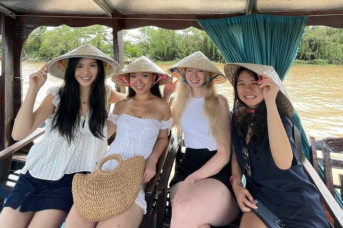 Full-Day Tour in Mekong Delta with Pick Up in Central District 1 - Con Lan, honey tea, and the fruit garden