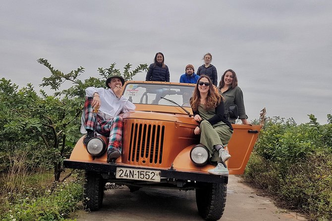 Hanoi Jeep Tour: Red River Countryside Culture & Daily Life - Leaving Hanoi Behind in a Classic Jeep
