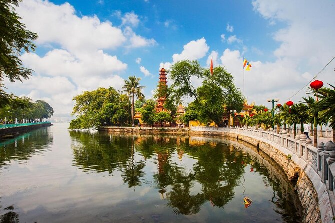 Hanoi Jeep Tours Led By Women: City & Red River Half Day - Ba Dinh Square connects landmarks with modern Hanoi
