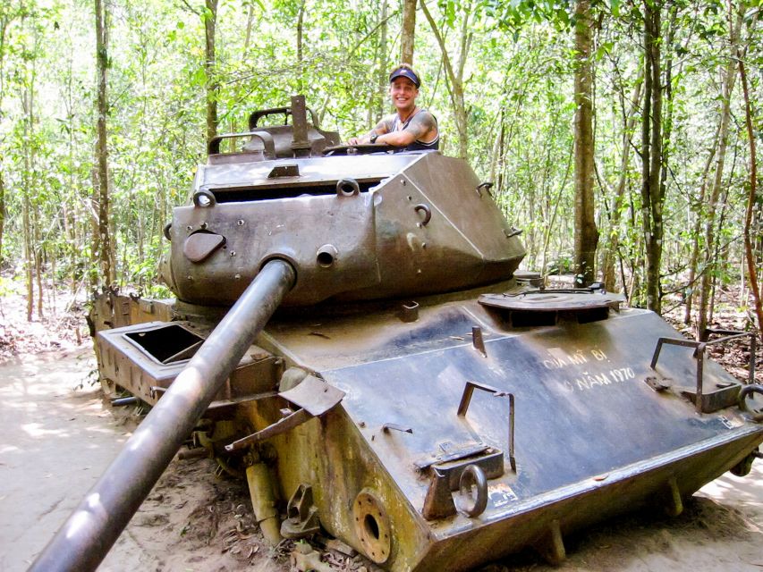 HCM: Cu Chi Tunnels & Mekong Delta with Coconut Village Tour - Cruising the Mekong near My Tho
