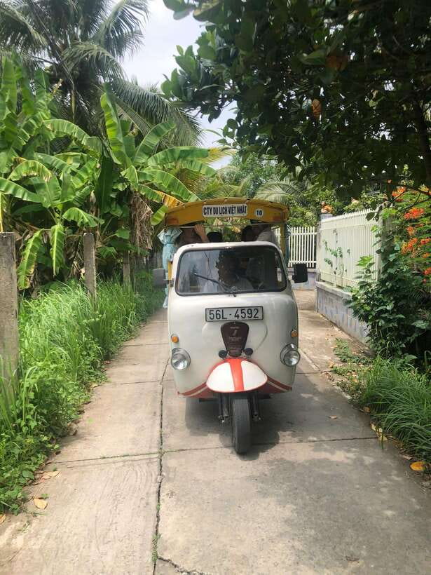 HCM: Mekong Delta Islands Boat & Tuk-Tuk Tour with Tastings - Rowing through the narrow canals