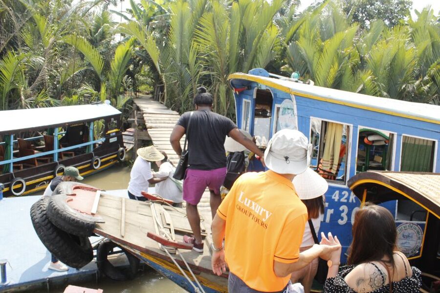 HCM: Mekong Delta, My Tho & Ben Tre Coconut Village - The hand-rowed sampan through coconut canals