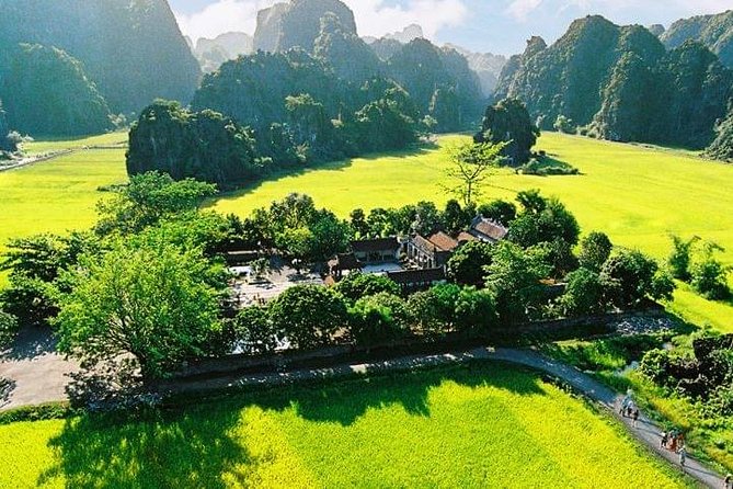 Hoa Lu Tam Coc Full-Day DELUXE Tour Including BUFFET LUNCH & River Boat Ride - Bich Dong and the bike ride