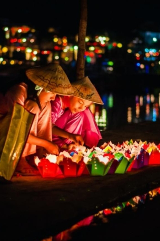 Hoi An: Hoai River Night Boat Trip and Floating Lantern - Boarding a Wooden Boat for Four