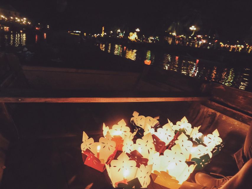 Hoi An: Night Boat Trip and Release Lantern at Hoai River - Sharing a small silk-lantern boat