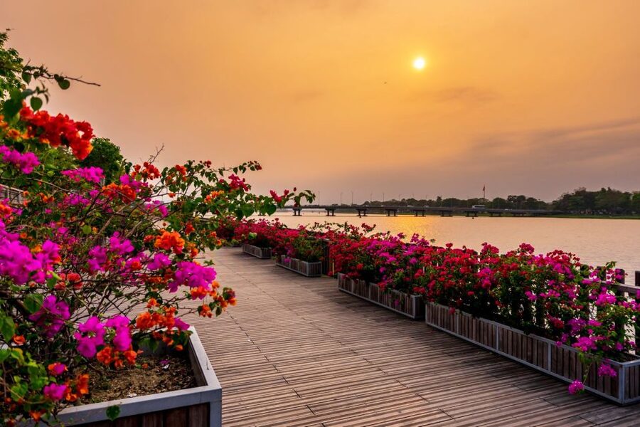 Hue: Sunset Cruise along Perfume River - Leaving central Hue by foot and boat