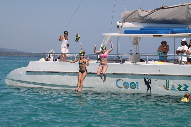 Jamaica Dunn's River Falls Party Cruise with Snorkeling - A catamaran ride with Jamaican scenery