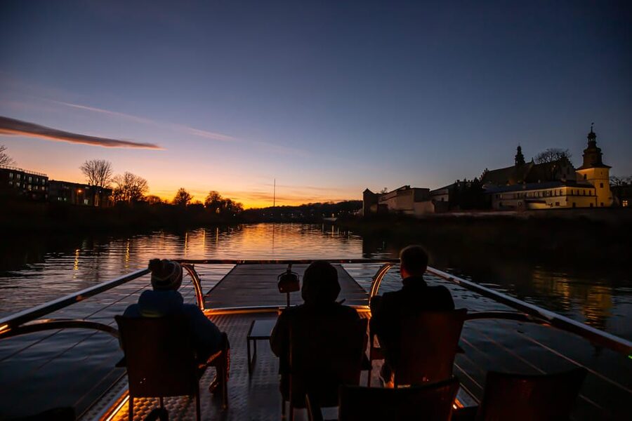 Krakow: Sightseeing Cruise on Vistula River with Audio Guide - Modern Krakow appears near the Manggha Centre