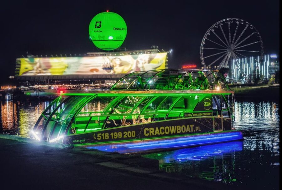 Krakow: Sightseeing Cruise on Vistula River with Audio Guide - A small catamaran with two ways to sit