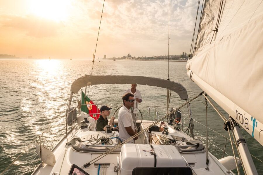 Lisbon: Private Sunset Cruise on the Tagus River with Drink - Comfort, families, and cooler evenings
