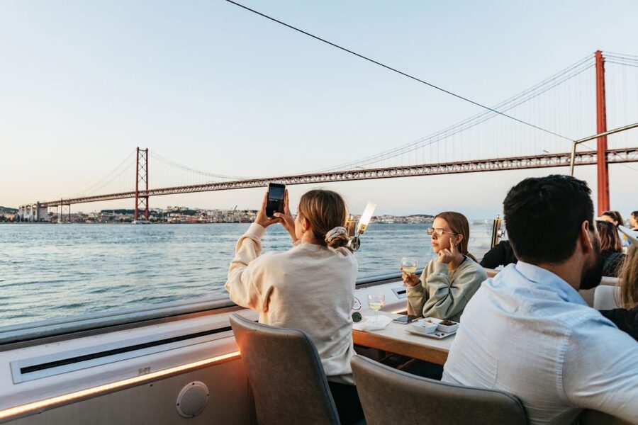 Lisbon: Sunset Cruise with Welcome Drink and Snacks - The welcome drink, snacks, and onboard mood