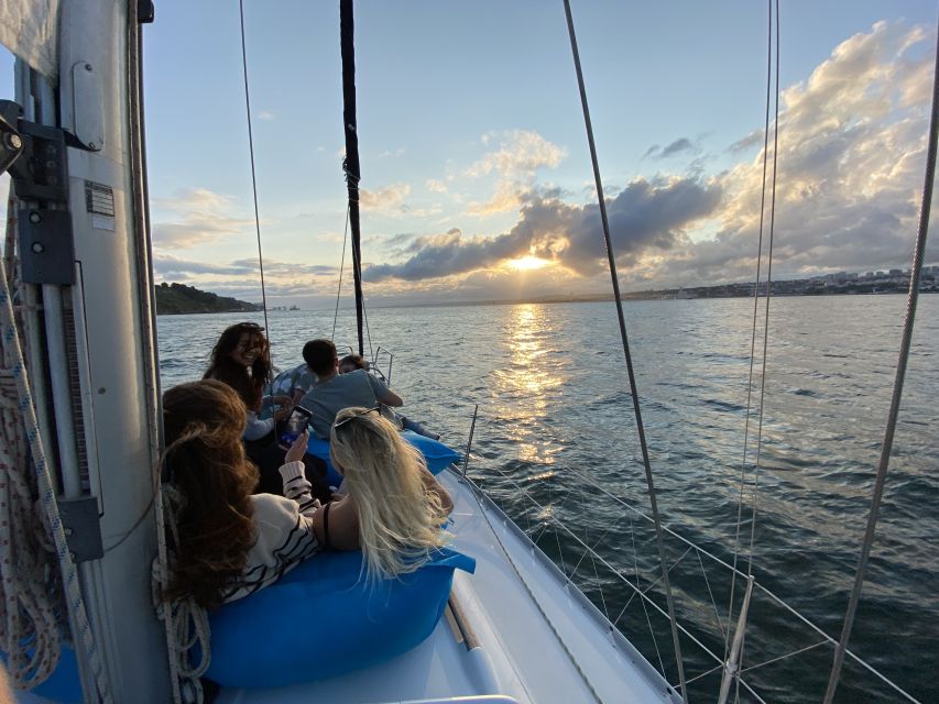 Lisbon: Tagus River Sunset Cruise with Drinks - Belém Tower at golden hour