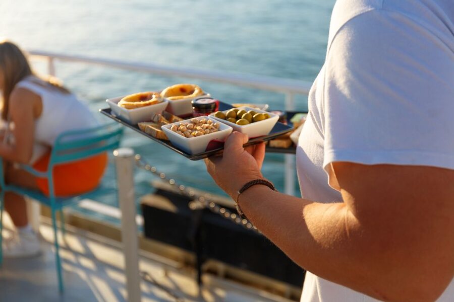Lisbon: Tagus River Sunset Tour with Snacks and Drink - Christ the King and the view back toward Lisbon