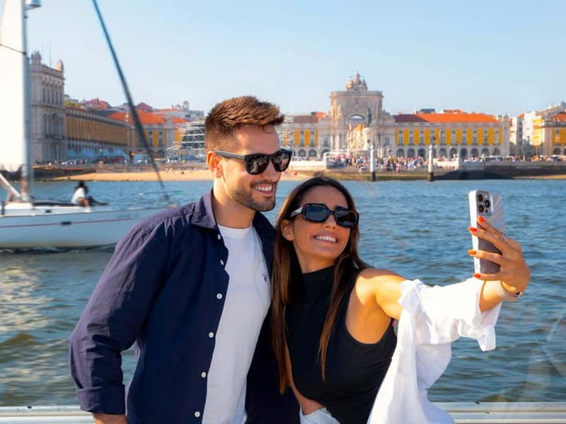 Lisbon: Tejo River Sightseeing Cruise - Leaving Praça do Comércio and crossing beneath the bridge
