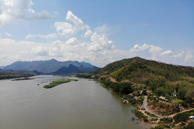 Luang Prabang: Cruise to Pak Ou Caves & Kuang Si Waterfalls - Lunch with river views and a possible elephant stop