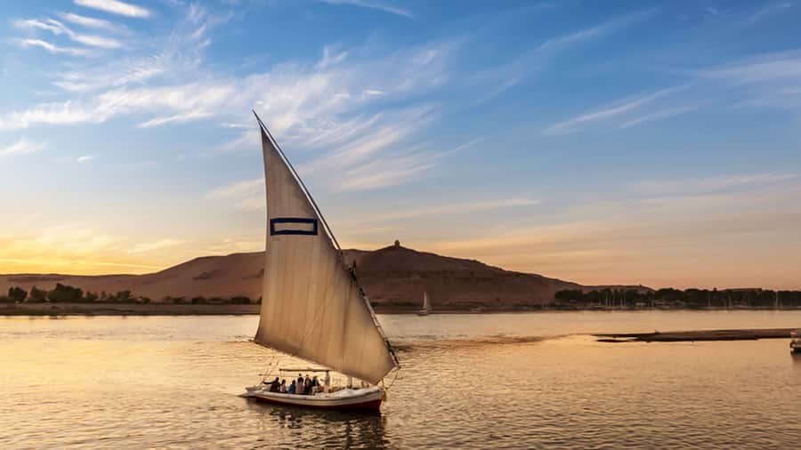 Luxor: Private Felucca Ride with Panoramic Nile Views - Boarding the traditional felucca
