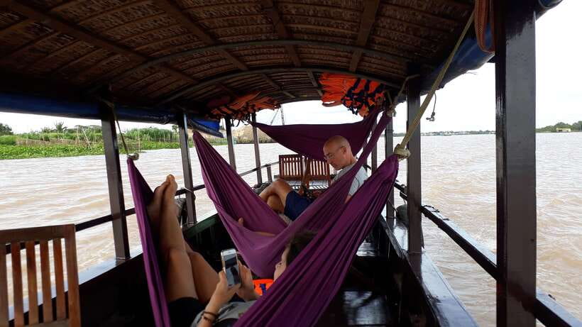 Mekong Day Tour by Car:Cai Be market, Local Island & Cycling - Coconut candy, honey tea, and puffed rice