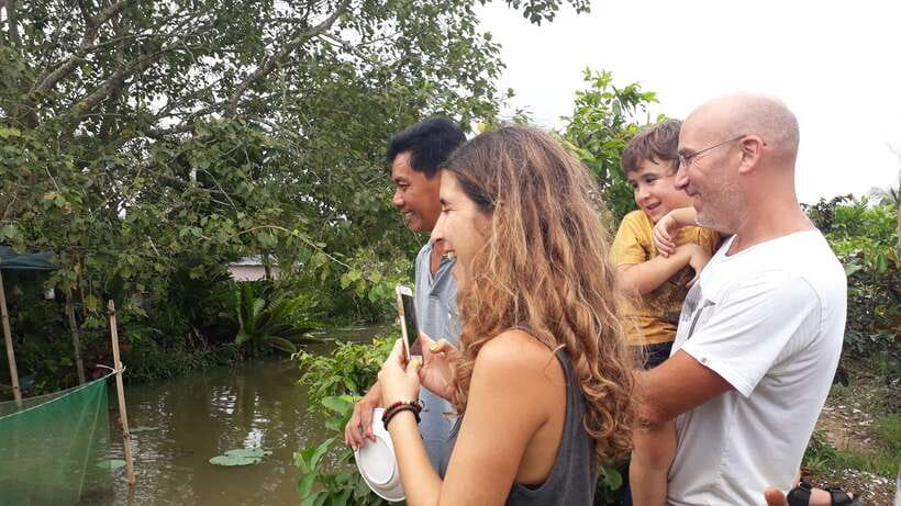Mekong Day Tour by Car:Cai Be market, Local Island & Cycling - Fruit, Southern folk music, and a local home