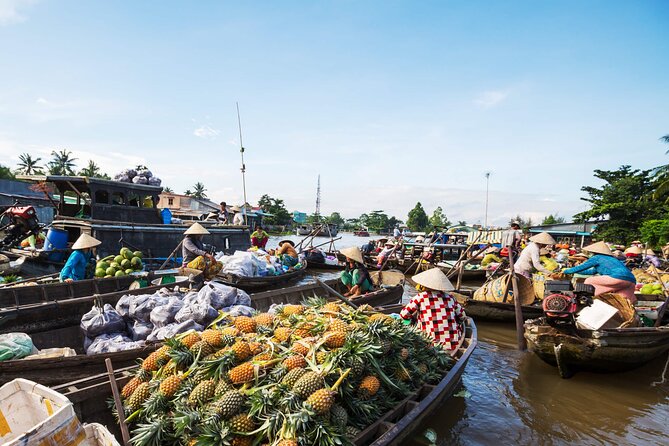 Mekong Delta & Cai Rang Floating Market 2-Day Tour from HCMC - Coconut candy, fruit, honey tea, and local music