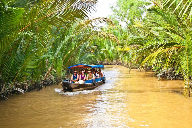 Mekong Delta Tour with Cooking and Kayaking - Fruit orchards and music by local villagers