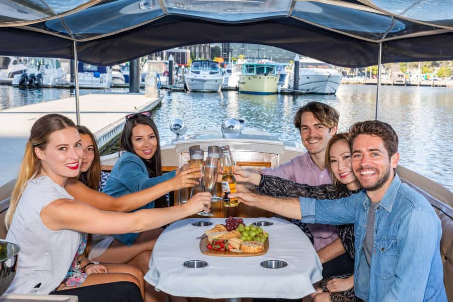 Melbourne: Private Yarra River Cruise w/ Cheese & Wine - Leaving Docklands on an electric boat