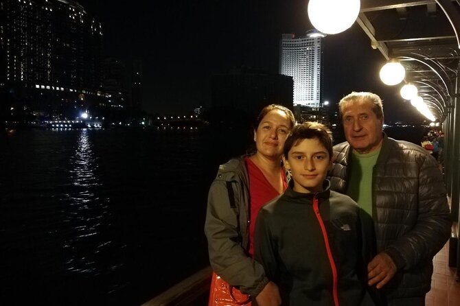 Nile Dinner Cruise in Cairo With Belly Dancing and Transfer - Belly dancing, Arabic songs, and the Tanoura show