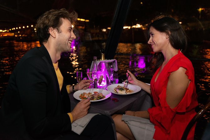 Paris 3-Courses Gourmet Dinner Seine River Cruise with Champagne - Window seats, music, and the onboard mood