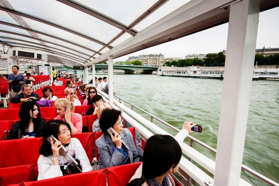Paris: Audio-Guided Bus Tour & Seine River Cruise - Audio quality and language choices